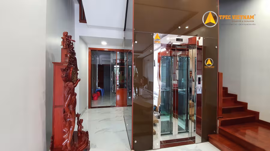 Thi công ốp vách kính thang máy